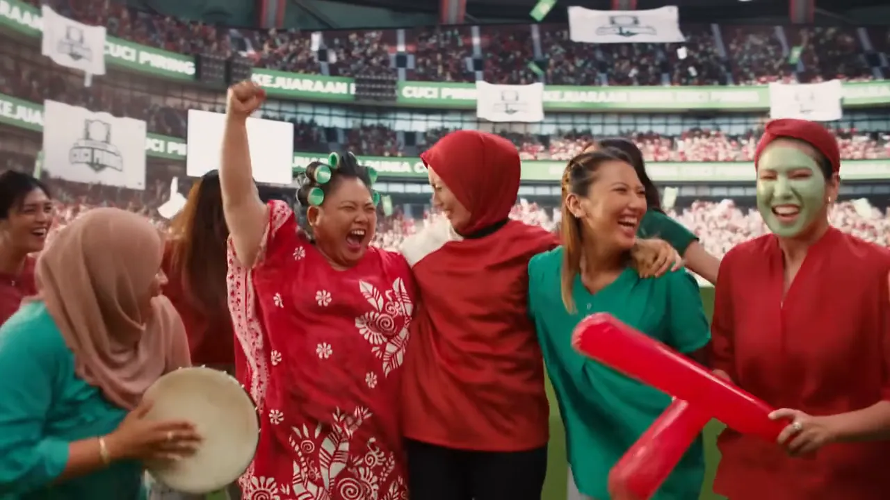 A frame from the Mothers Are Athletes stadium celebration film